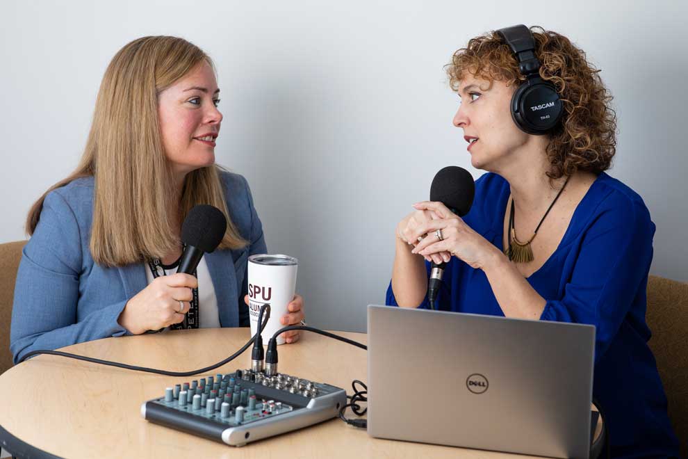 Alumni Director Amanda Stubbert (right) hosts the SPU Voices Podcast.