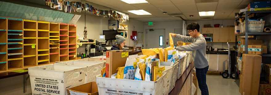 SPU students work in the mail room