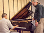Music faculty enjoy the new piano performing space