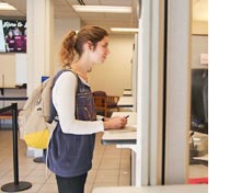 A student at the Student Financial Services office