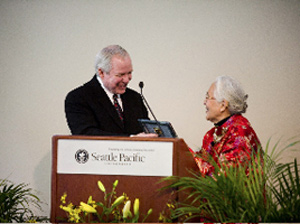 SPU President Philip Eaton, and Alumna of the Year En Ying Zhou