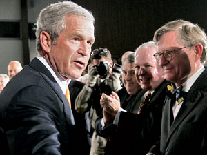 SPU President Philip Eaton meets President George W. Bush at Presidents Summit
