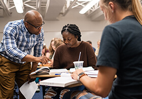 Professor with students