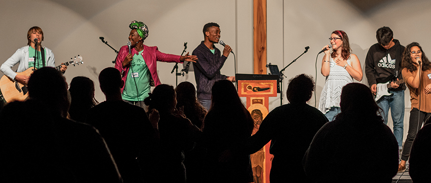 SPU's praise and worship band performs at chapel on the road.
