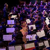 The SPU orchestra, directed by Dr. Christopher T. F. Hanson, performs at Benaroya Hall