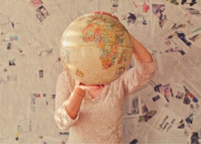 person holding globe
