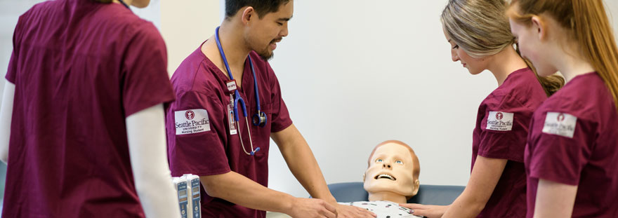 nursing students test on dummy patient