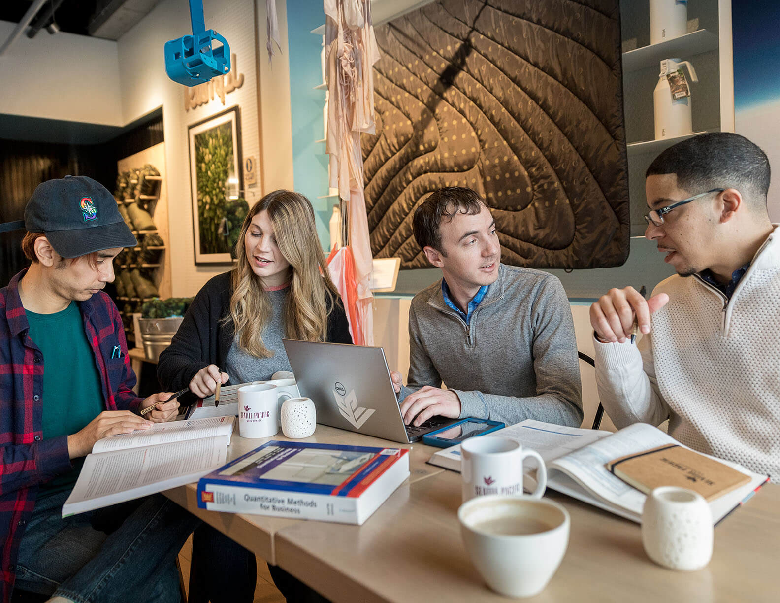 SPU business graduate students work on a group project | Photo by Dan Sheehan