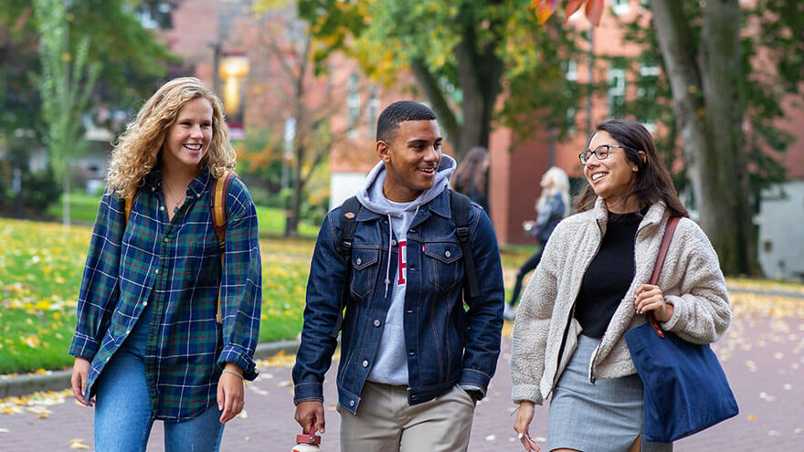 Three SPU students stroll through Tiffany Loop