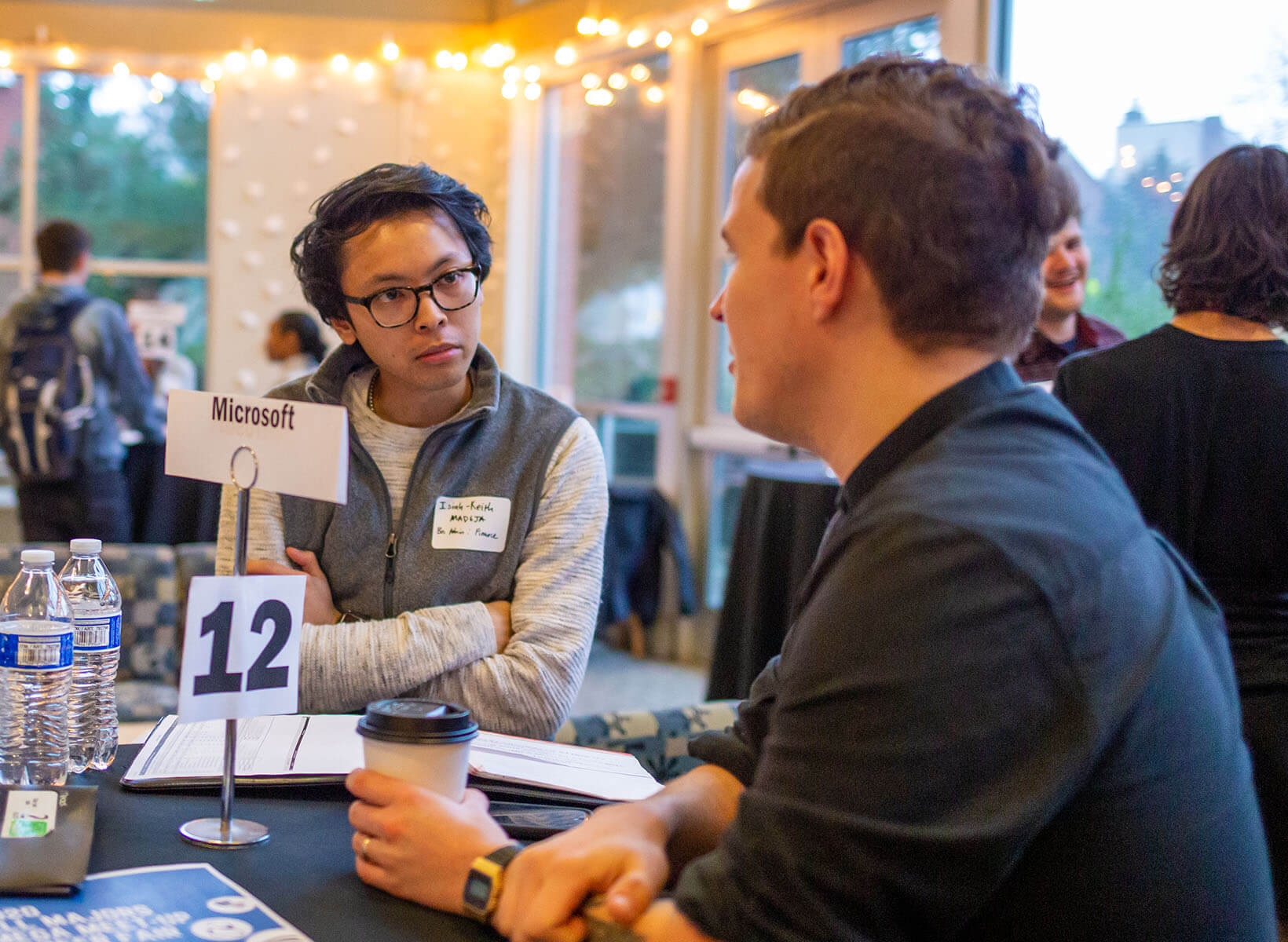 An SPU student attends a networking event on campus