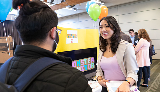A student presents at the 2022 Social Venture Plan competition in Upper Gwinn Commons