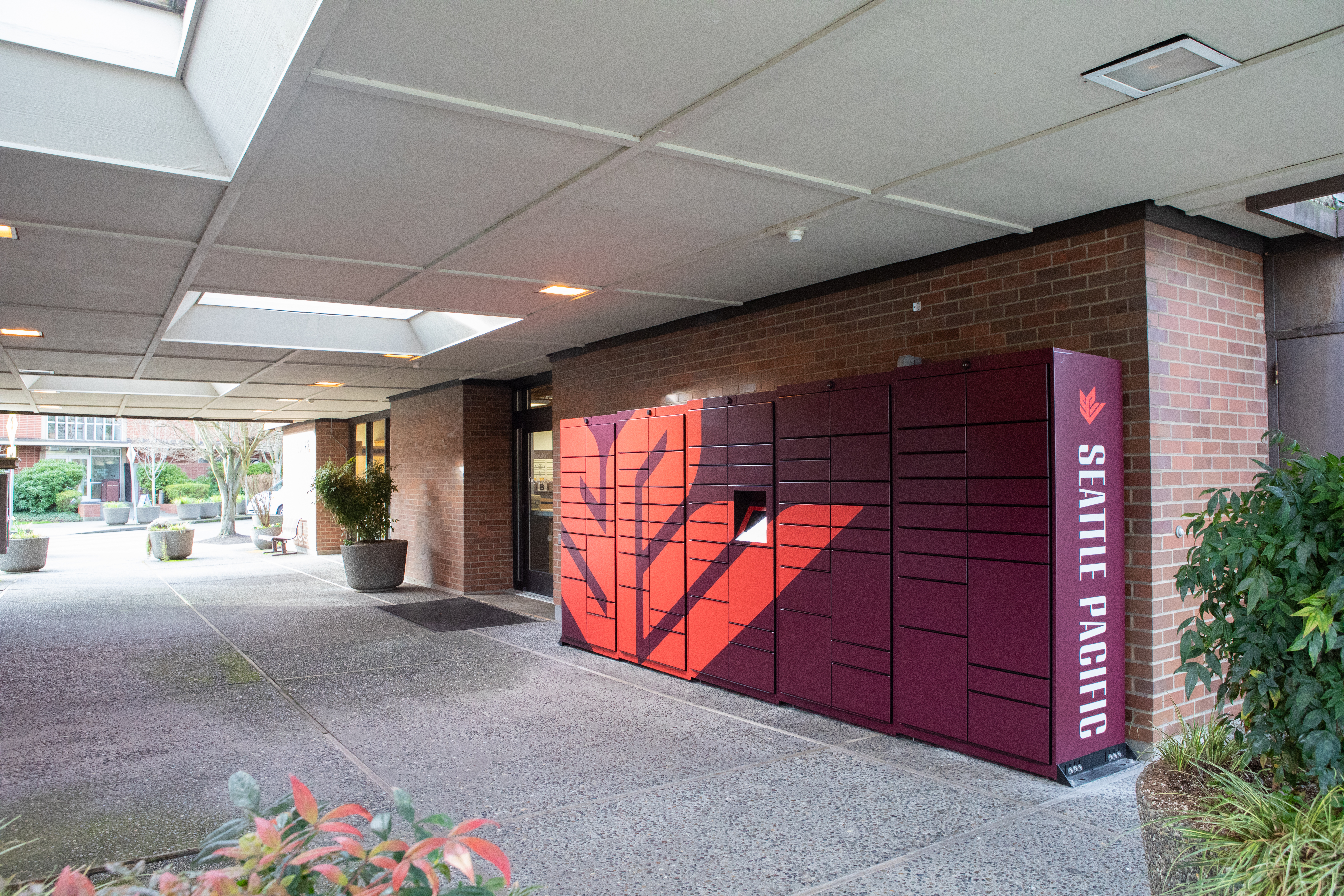 An image of Luxer lockers outside the Mailing and Copying Center
