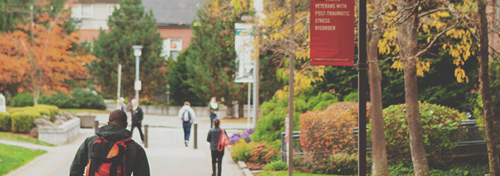 A student walks home after a day of class