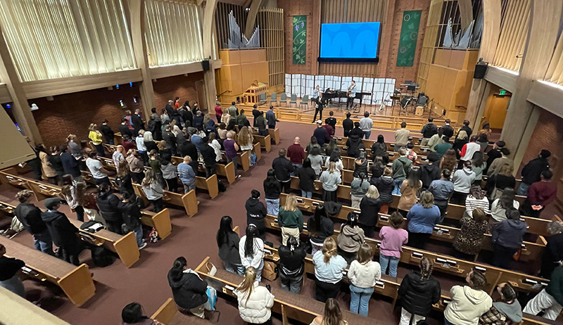 Students, faculty, and staff gather together for Chapel services