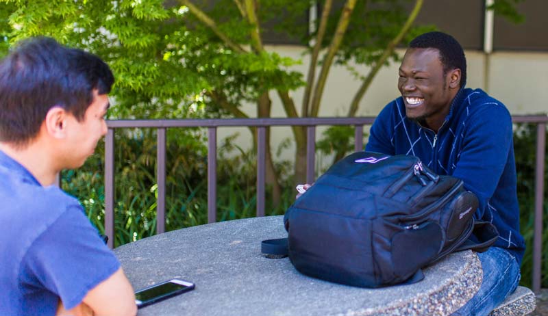 Students outside talking
