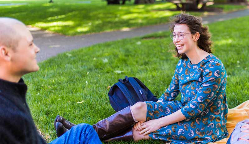 Students sitting outside
