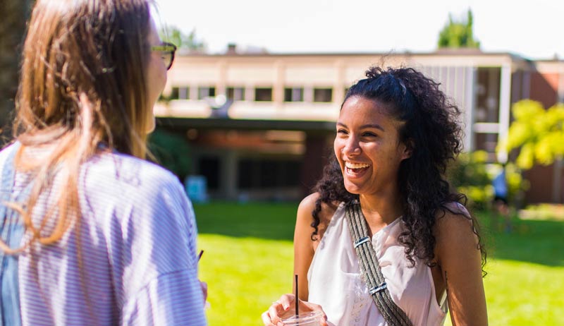 Students outside talking