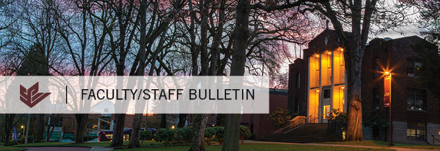 View of McKinley Hall's glowing orange light from Tiffany Loop at sunset