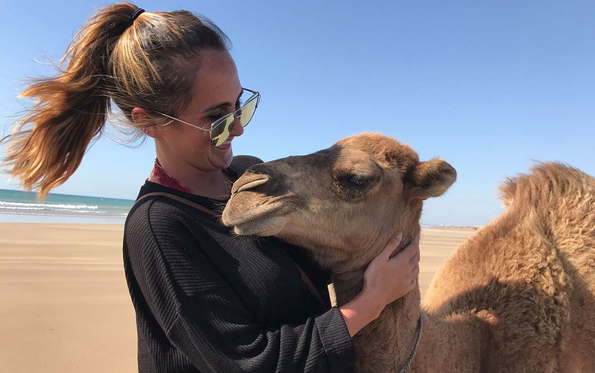 Student with a camel