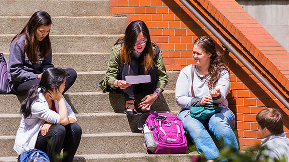 SPU students study on the sunny steps - photo by John Crozier
