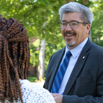 SPU Vice President of Student Life Jeffrey Jordan talking with a student