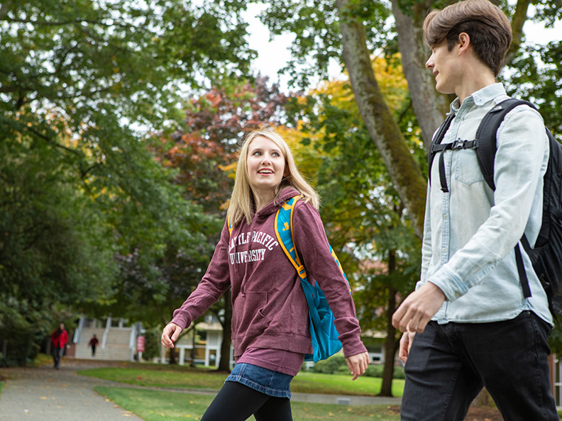 Students walk through Tiffany Loop on the SPU campus