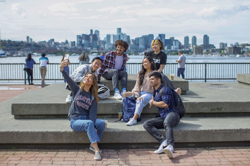 Students pose for a selfie in front of Lake Union, Seattle