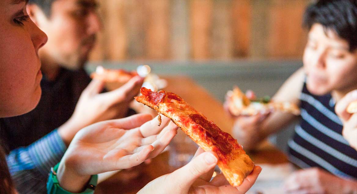 Students at Ballard Pizza Company