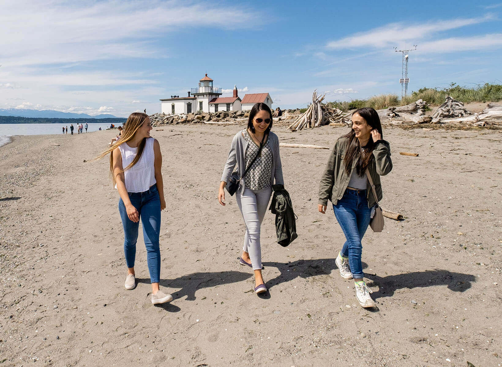 SPU students walk along the beach near Discovery Park - photo by Chris Yang