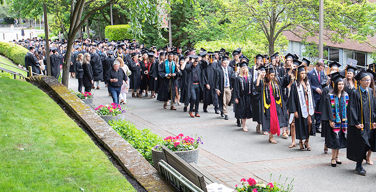 SPU students file in to Tiffany Loop for the 2019 Ivy Cutting Ceremony - photo by Mike Siegel