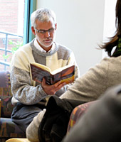 Professor Jack Levison reads to campus community members who gathered for Thursday Food for Thought on October 29, 2009.