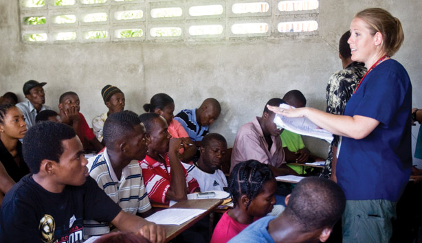 Kira Mauseth teaching volunteers in Haiti.