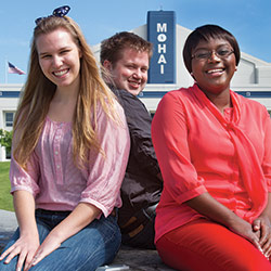 Student interns Lydia Hazel, Forest Brown, and Liz Kimotho
