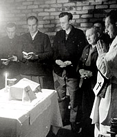 POWs celebrate midnight mass during World War II.