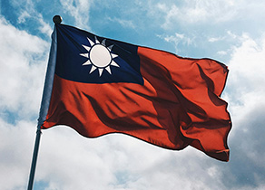 The Taiwan flag billows in the sunlight